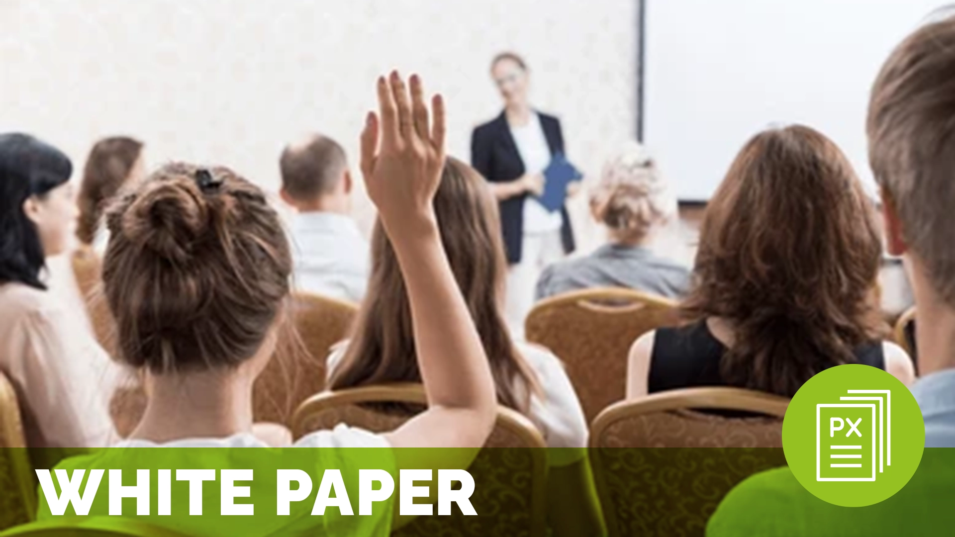 a group of people in a conference room. a woman has her hand raised; text reads white paper; meant to represent emotional needs of staff