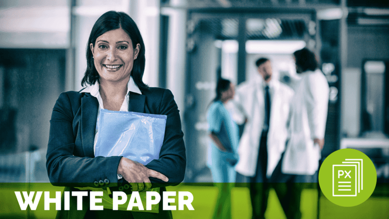 a businesswoman smiling holding a bundle of papers