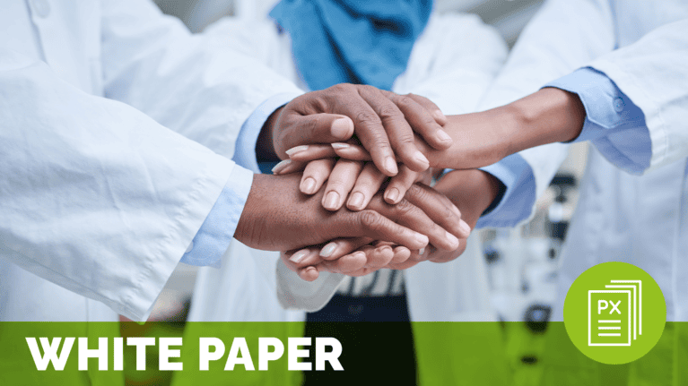 a group of people in white lab coats holding hands together
