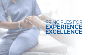 a black woman in scrubs holds hands with a patient; the text overlaid on top of the image reads principles for experience excellence