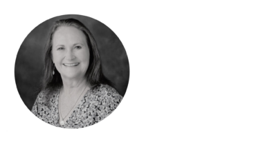 a black and white headshot of dr. susan k. lee
